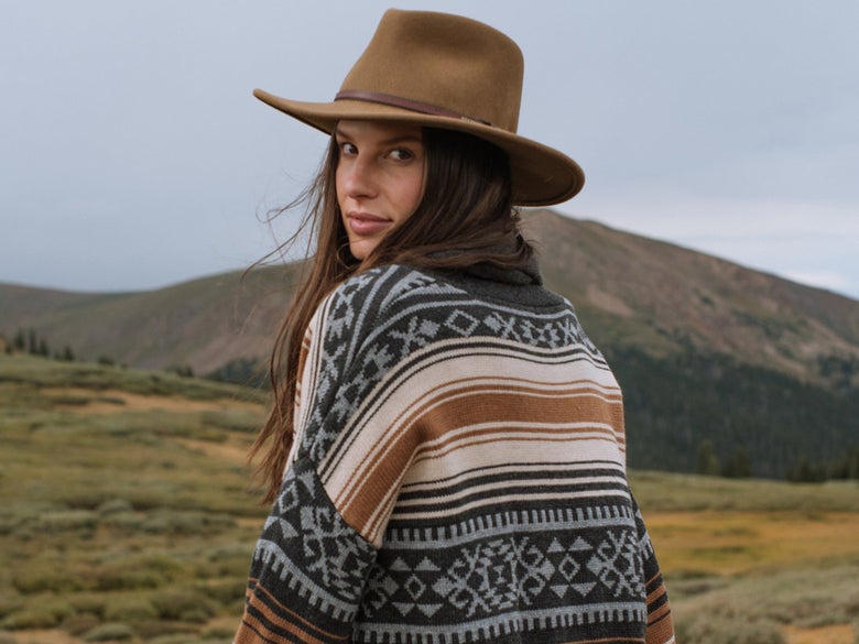 A woman in the mountains wearing the Stetson Bozeman Crushable Outdoor Collection Felt Hat