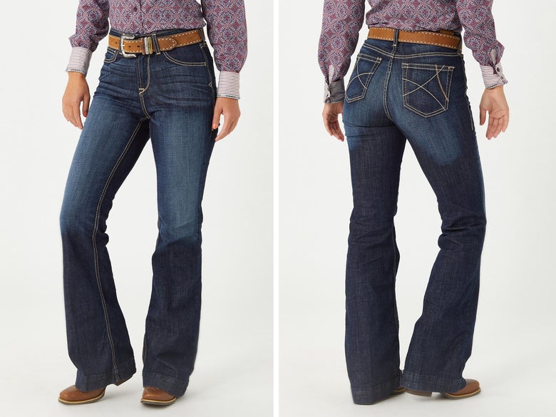 A lady modeling the Ariat Ella Dark Wash Slim Trouser Jeans