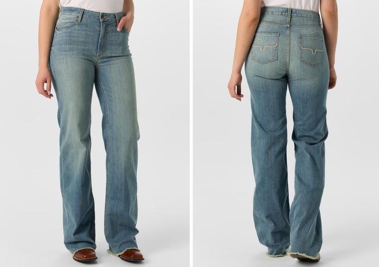 A lady modeling the Olivia High Rise Wide Leg Jeans