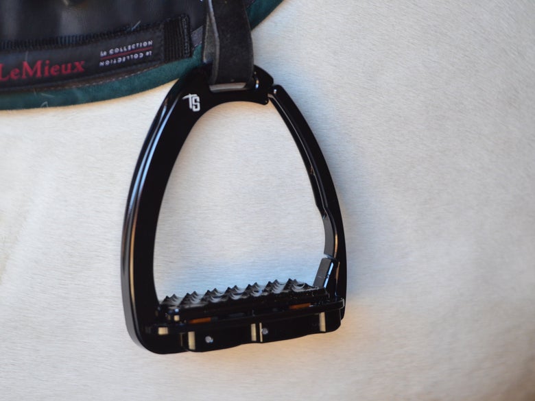 A close up photo of the Tech Stirrups Venice Plus EVO Sloped Safety Stirrups.