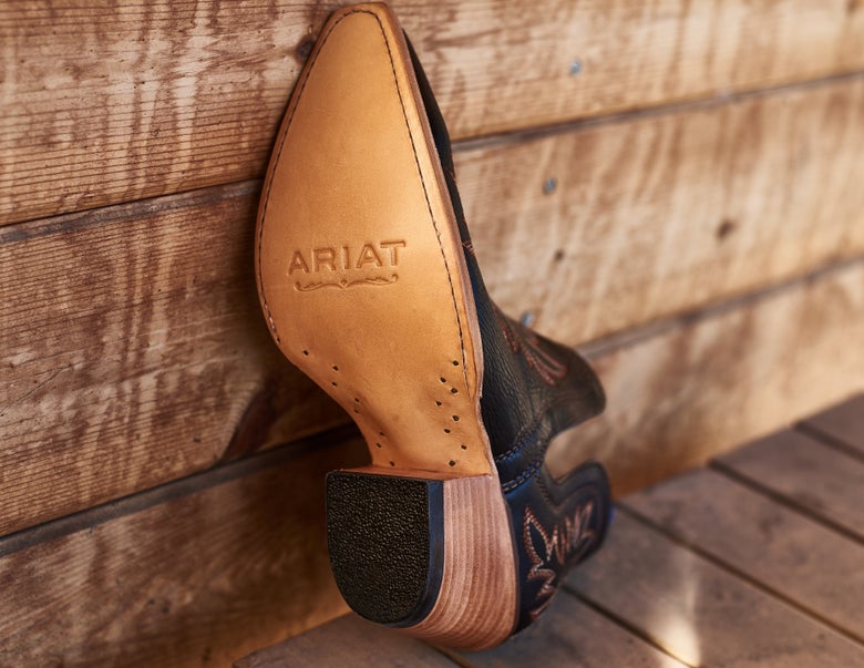 Ariat boot with leather outsole and heel