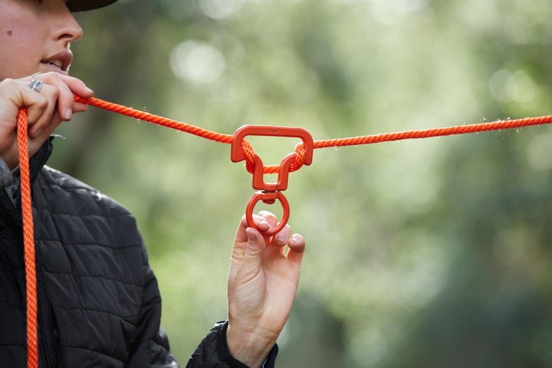 Gillian showing the no-knot swivel easily being secured to the nylon rope. 
