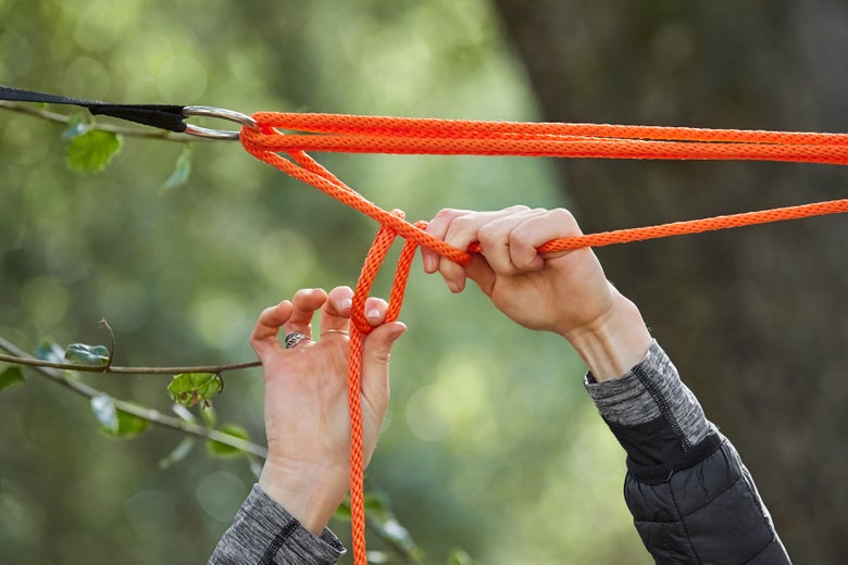 Gillian finishing off her high line with securing a quick-release slip knot. 