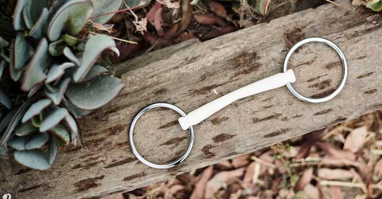 Duo Herm Sprenger Bit made from soft, flexible plastic that is gentle on the horse's mouth.