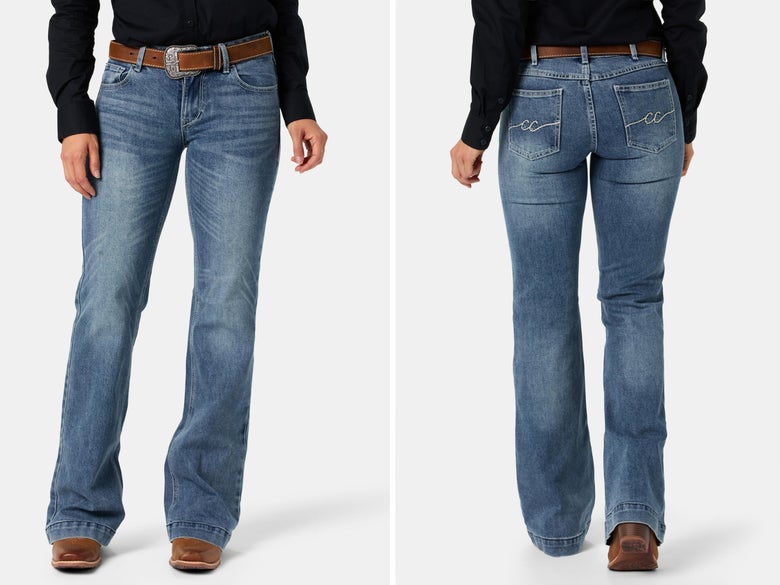 A lady modeling the CC Western Signature Mid-Rise Trouser Jeans