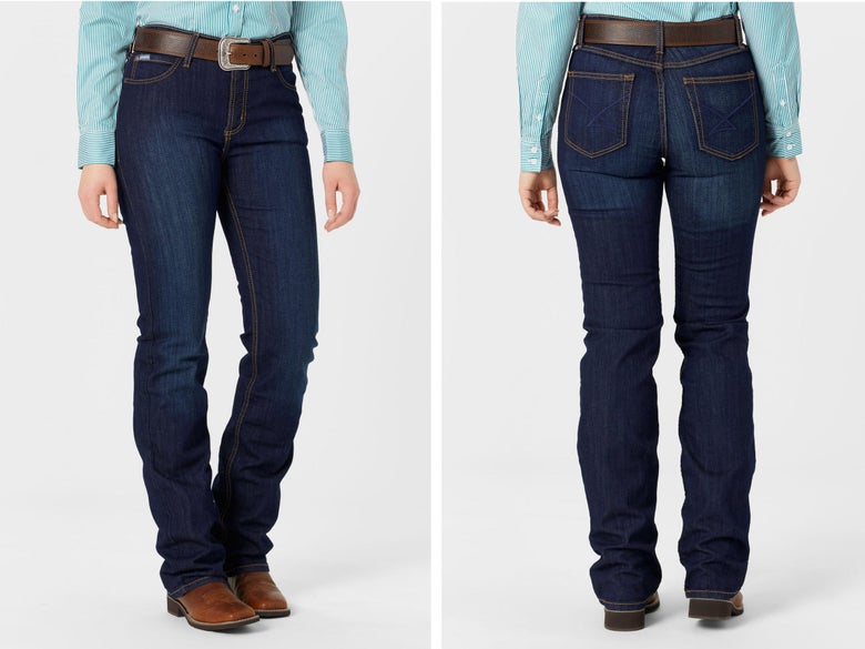 A lady modeling the Cinch Jenna Slim Dark Wash Boot Cut Jeans