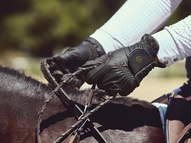 A horseback rider using the Correct Connect 3 in 1 Breastplate
