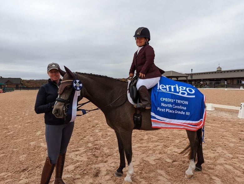 Meghan Benge with her pony Rudy and coach Melissa Vaughn at the 2023 CPEDI in Tyron.