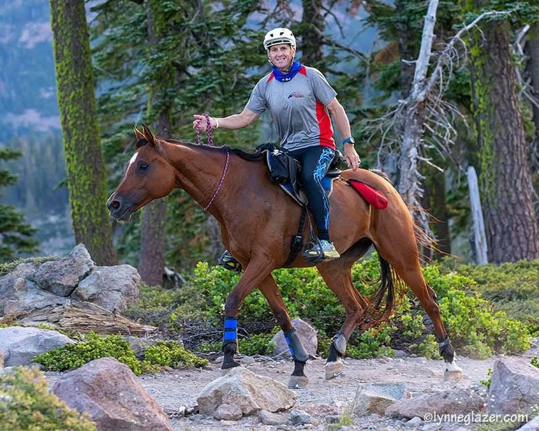 Jeremy riding his horse Treasured Moments in the 2023 Tevis Cup with just a neck rope