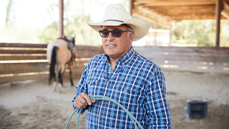 Roping instructor, Ronnie Garcia, with a rope in hand.