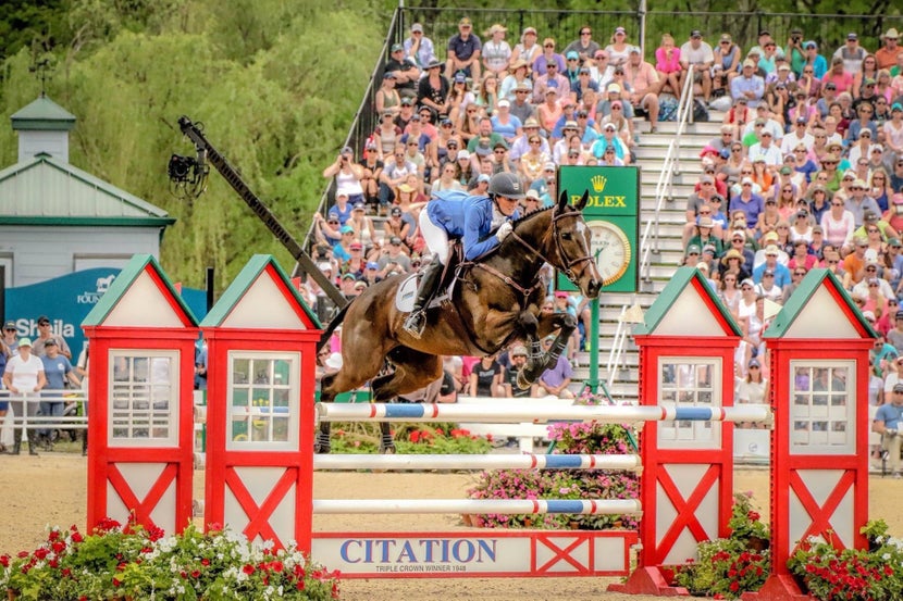 Bec competing Indy 500 on a show jumping course. 