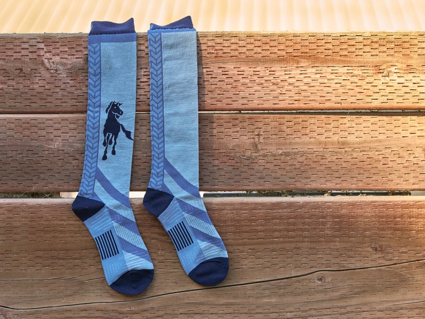 Side view of the three colors of the Kerrits Free Spirit Wool Knee High Socks next to each other.