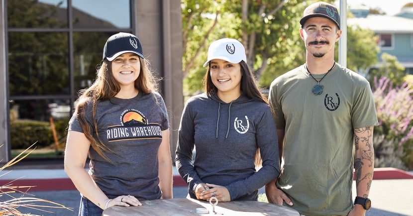 Girls and guy wearing Riding Warehouse ballcaps