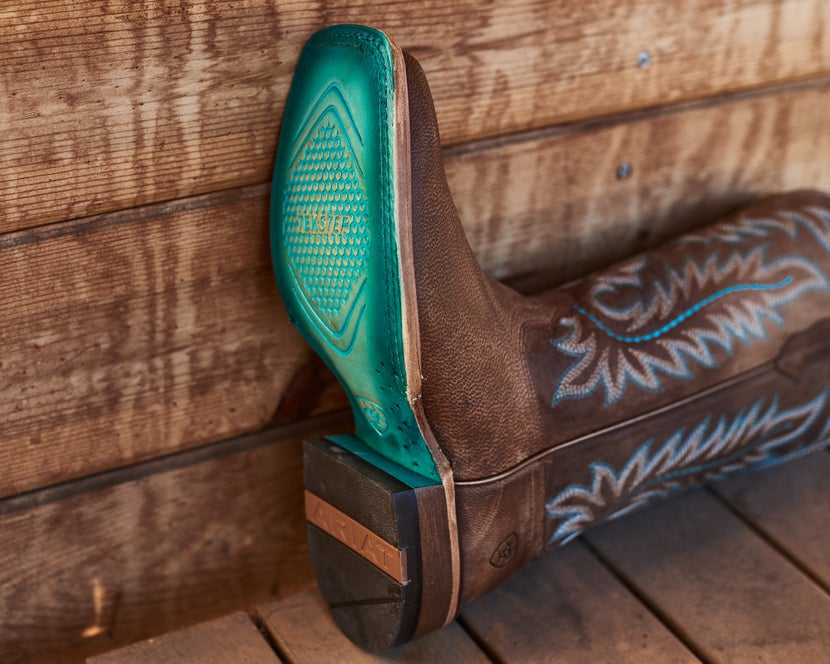 An Ariat boot with a hybrid outsole and heel.