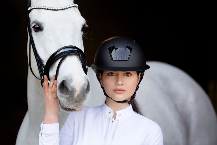 Woman wearing the Kask Kooki Lady Helmet.