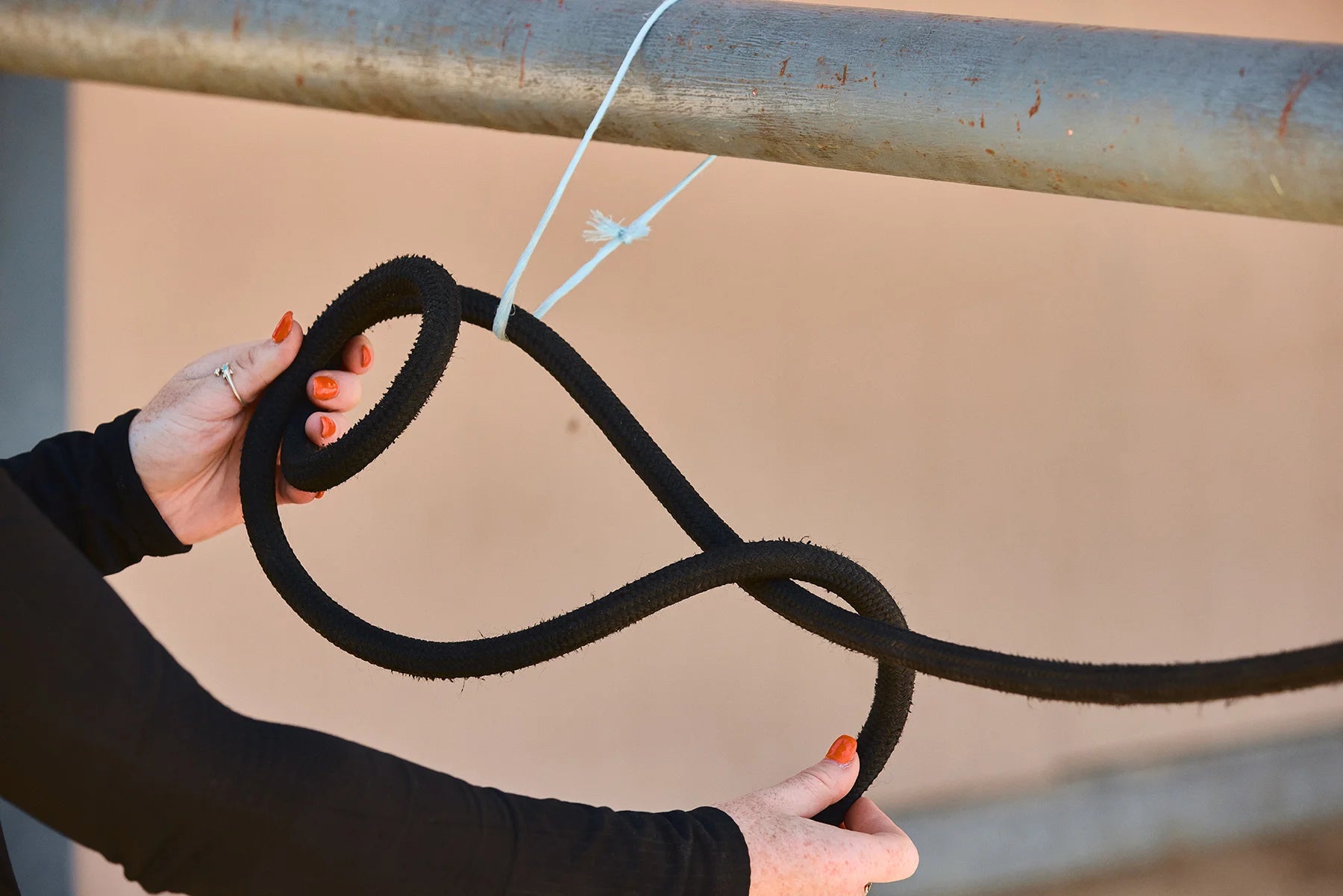 Bring the rest of your loose rope over the clipped end.