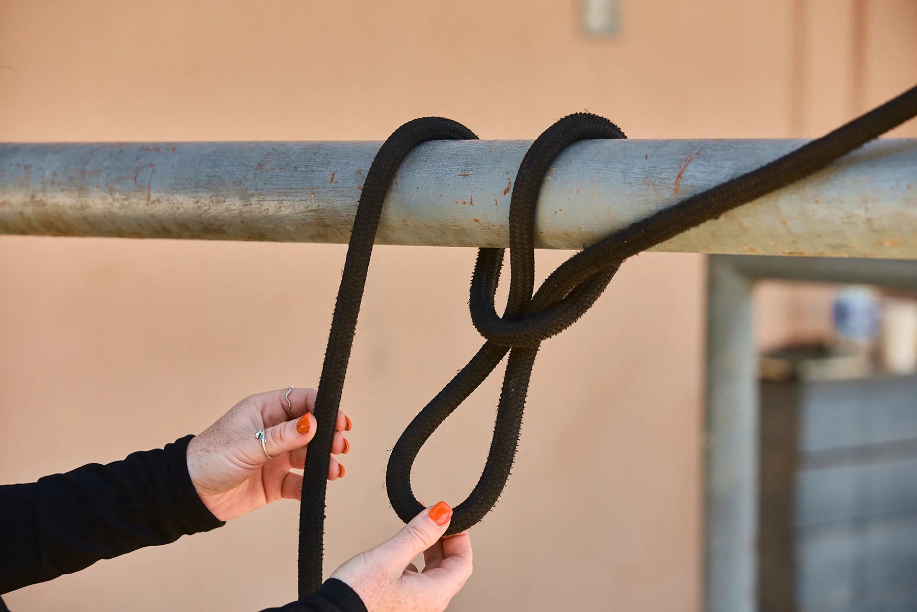 Pinch the clipped end and put the created loop down through your initial loop.