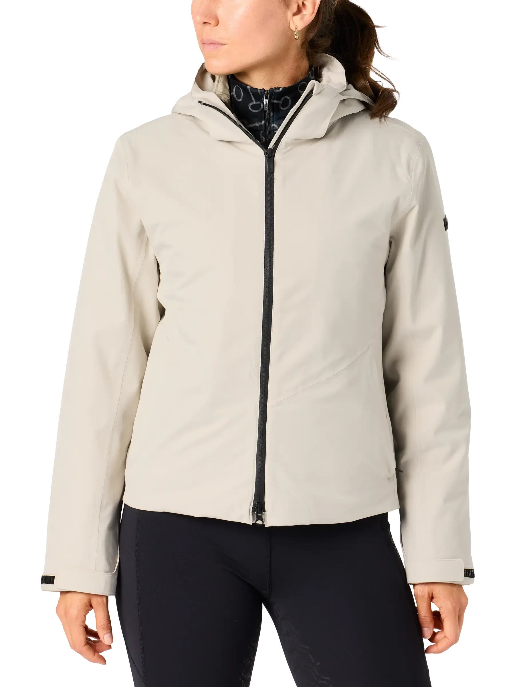 A woman wearing the Ariat Troika H20 2-in-1 Parka.