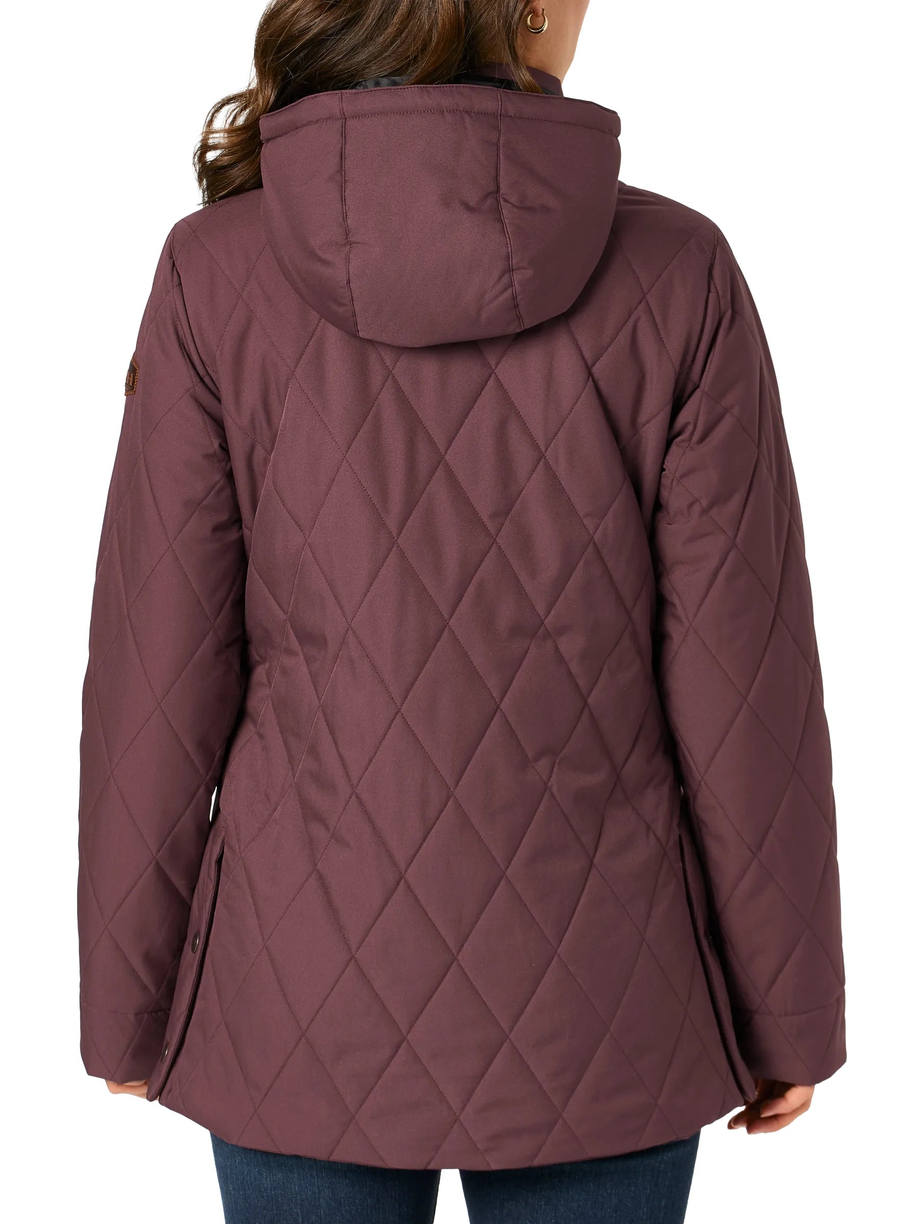 Front view of a woman wearing the Cinch Women's 3/4 Length Quilted Barn Coat Jacket.