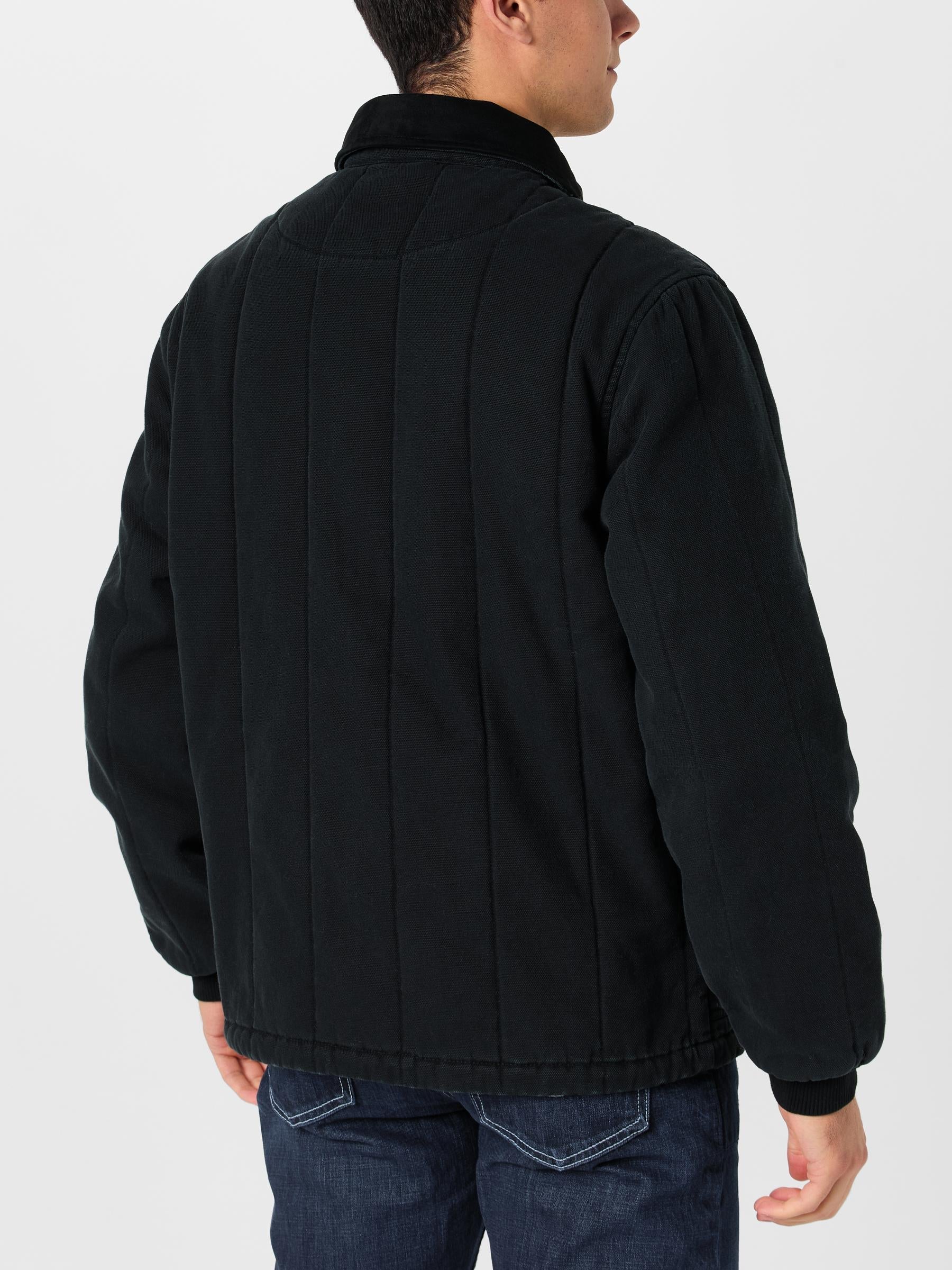 Back view of a man wearing the Kimes Ranch Men's Lewiston Jacket.