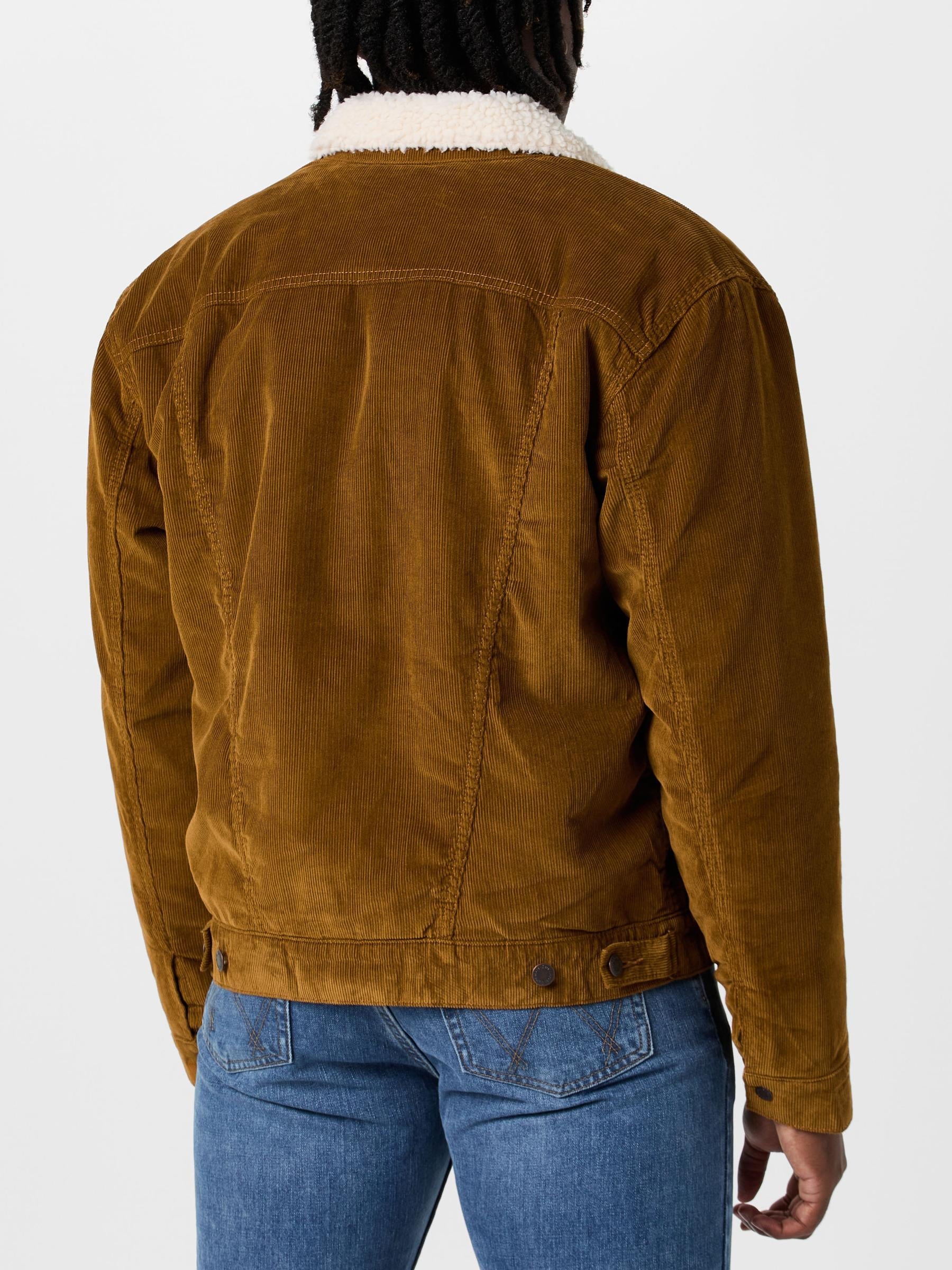 Back view of a man wearing the Wrangler Men's Sherpa Lined Corduroy Jacket.