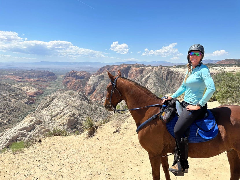 Natalie on her horse at the top of a mountain. 