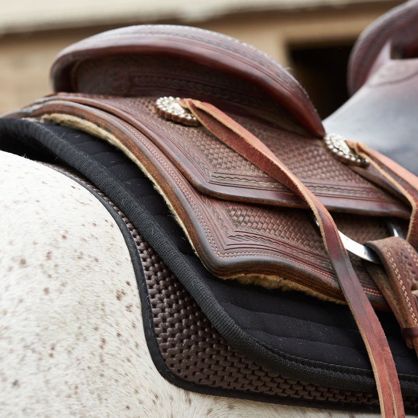 Western saddle with western saddle pad and liner